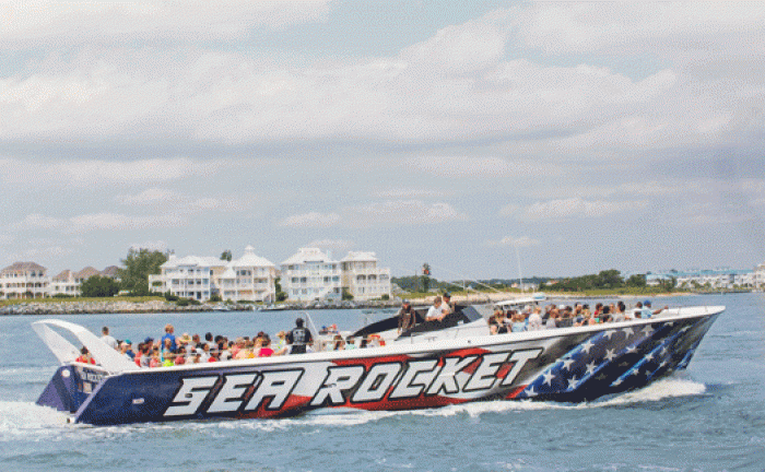 sea rocket boat in bay