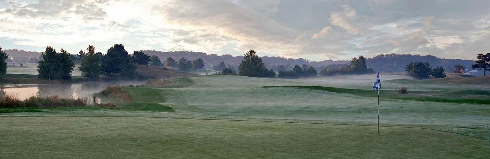 foggy golf course at sunrise